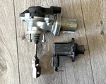 2014-2017 Volkswagen Jetta Passat Actuator Valve Set 06K145613C, 06H145710F, Oem Used. Price: $175.00.