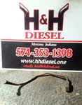 Caterpillar 2319034 - Hose Assembly Used. Price: $62.00.