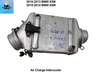 17517589469-02 10 To 13 Bmw X5M 4.4L Twin Turbo Air Charge Intercooler Used. Price: $129.00.