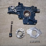 Kubota 1J755-04223 Front Cover And Oil Pump V3307 SSV75 SVL75-2 1J755-04220 Used. Price: $179.95.