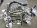 New Oem '94 - '97 Mazda Miata Complete Water Hose Kit. Price: $158.00.